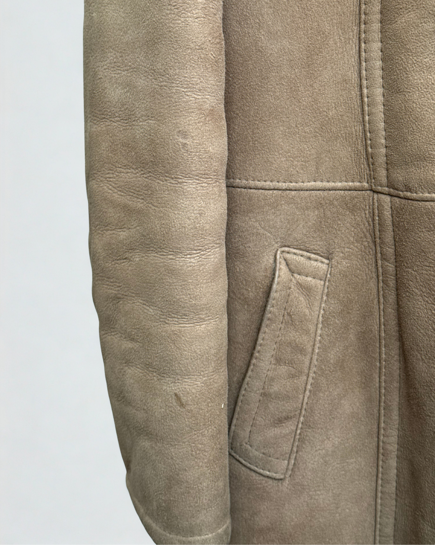 Sleeve detail showing stains on vintage lammy coat