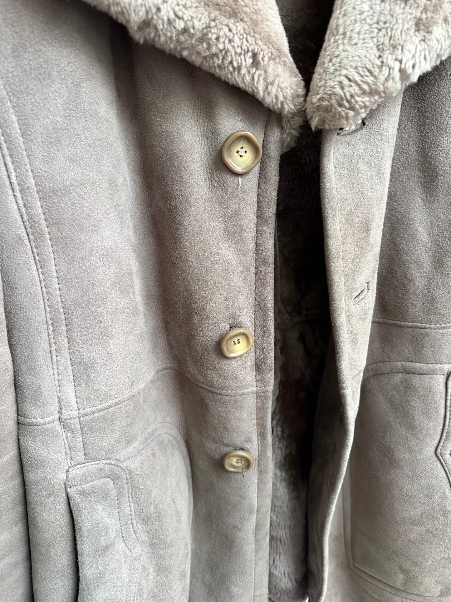 Button detail on vintage mens shearling coat