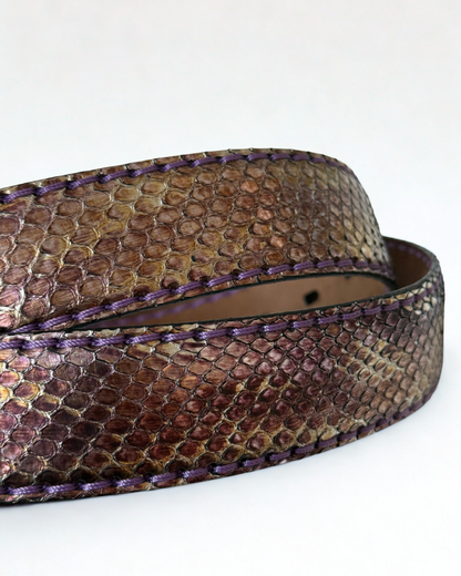 Close up of python leather texture on vintage JMADE belt in purple and gold
