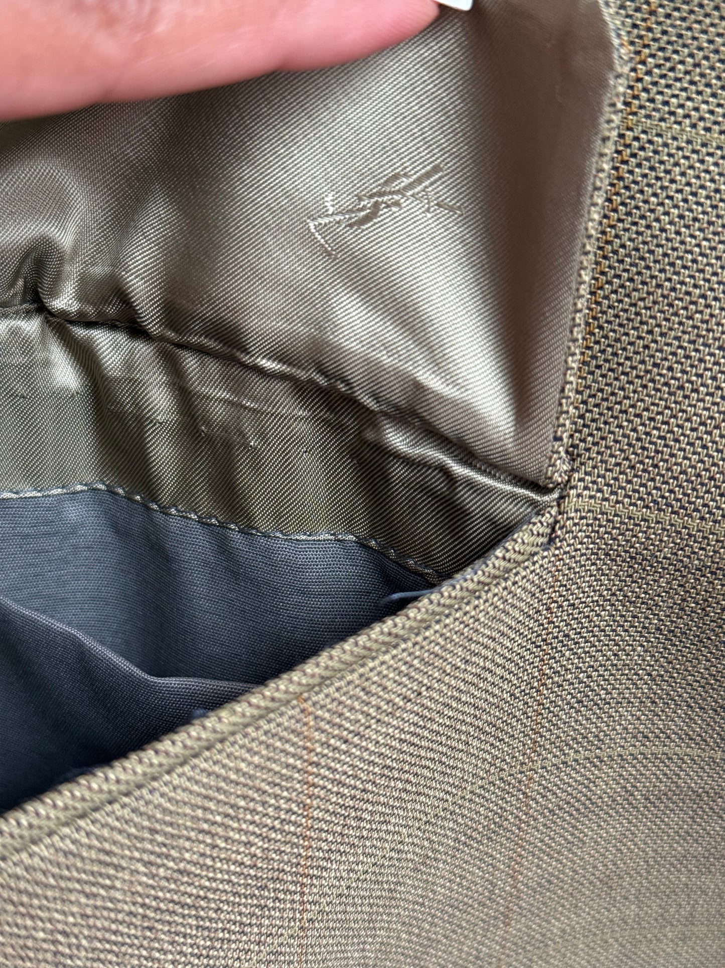 Yves Saint Laurent logo lining inside vintage suit jacket