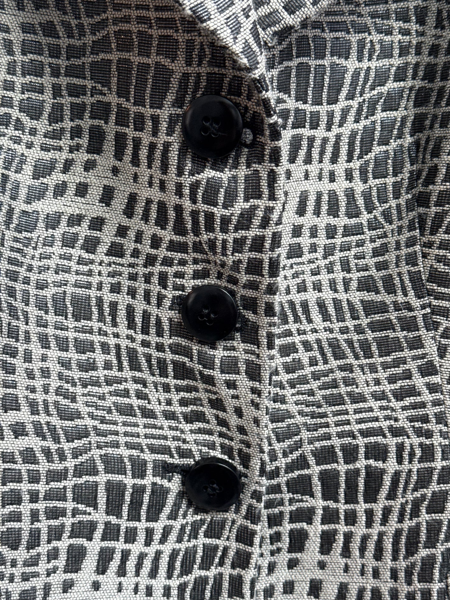 Detail showing buttons of vintage Armani Collezioni grey blazer
