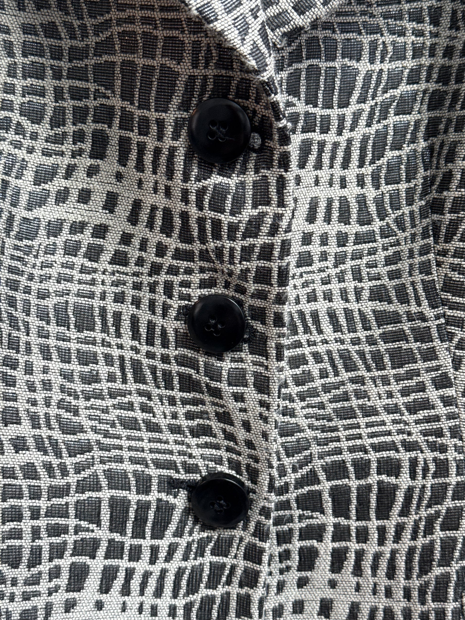 Detail showing buttons of vintage Armani Collezioni grey blazer