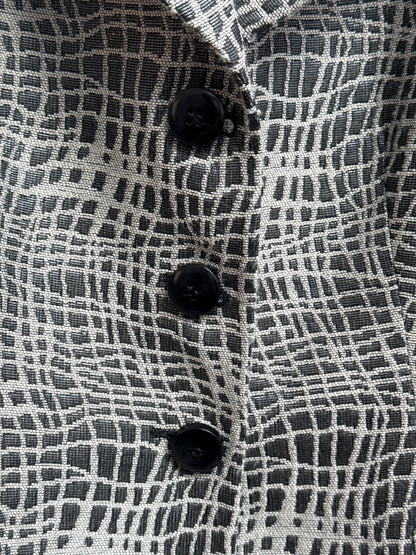 Detail showing buttons of vintage Armani Collezioni grey blazer