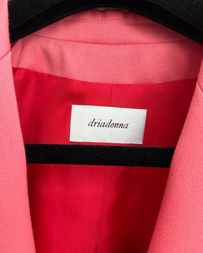 Vintage label detail inside pink womens suit blazer