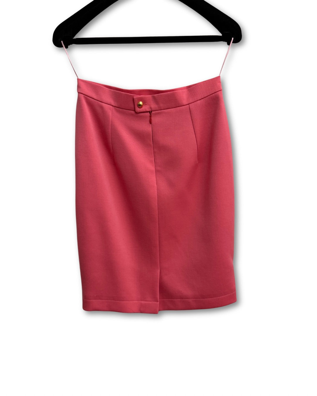 Back view of vintage womens pink blazer showing tailored fit
