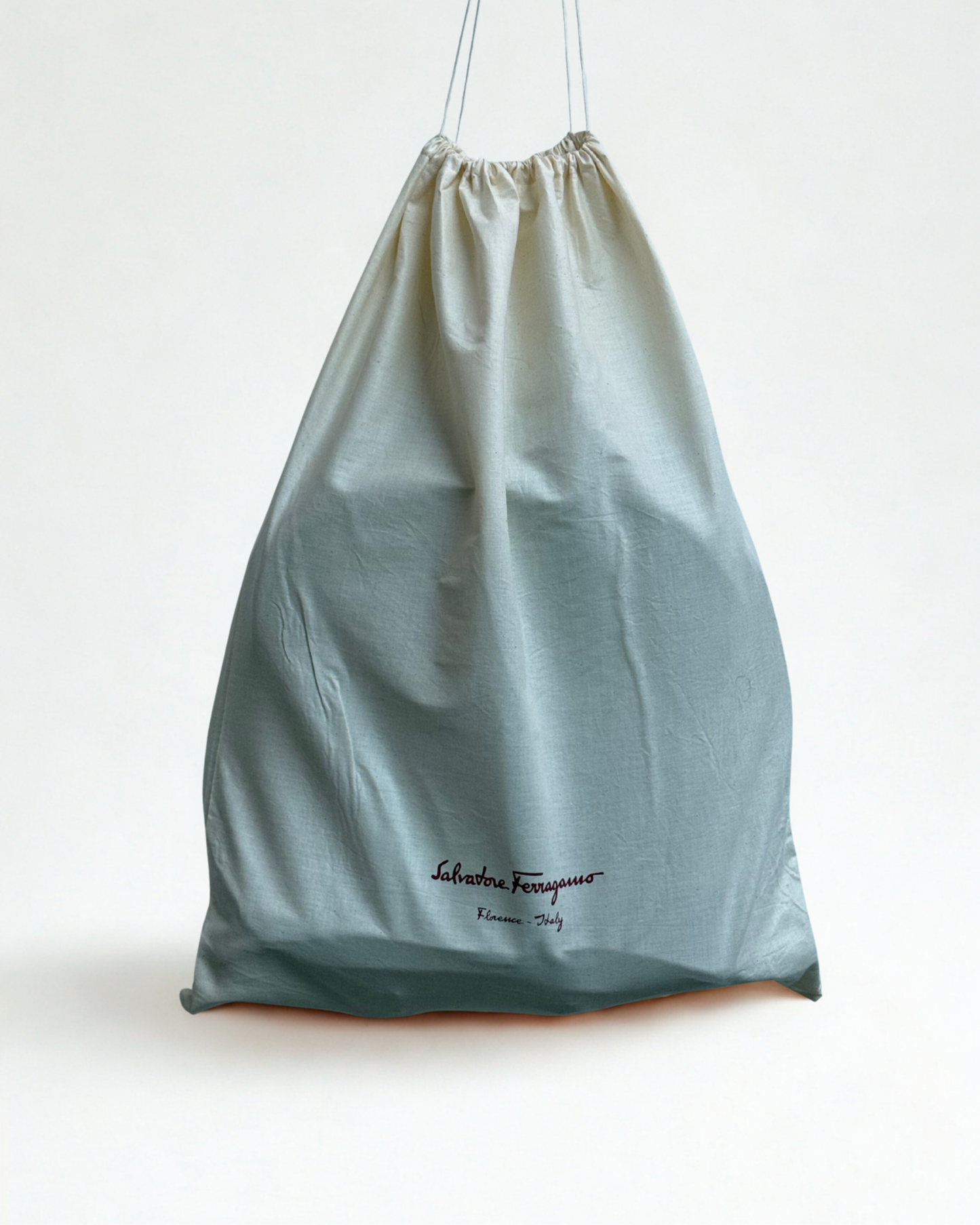 Dufflebag with Salvatore Ferragamo logo on a white background