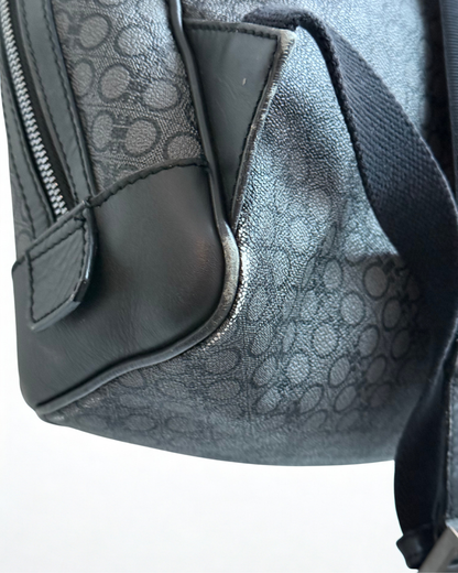 Back view of Salvatore Ferragamo grey leather backpack with pre-loved wear