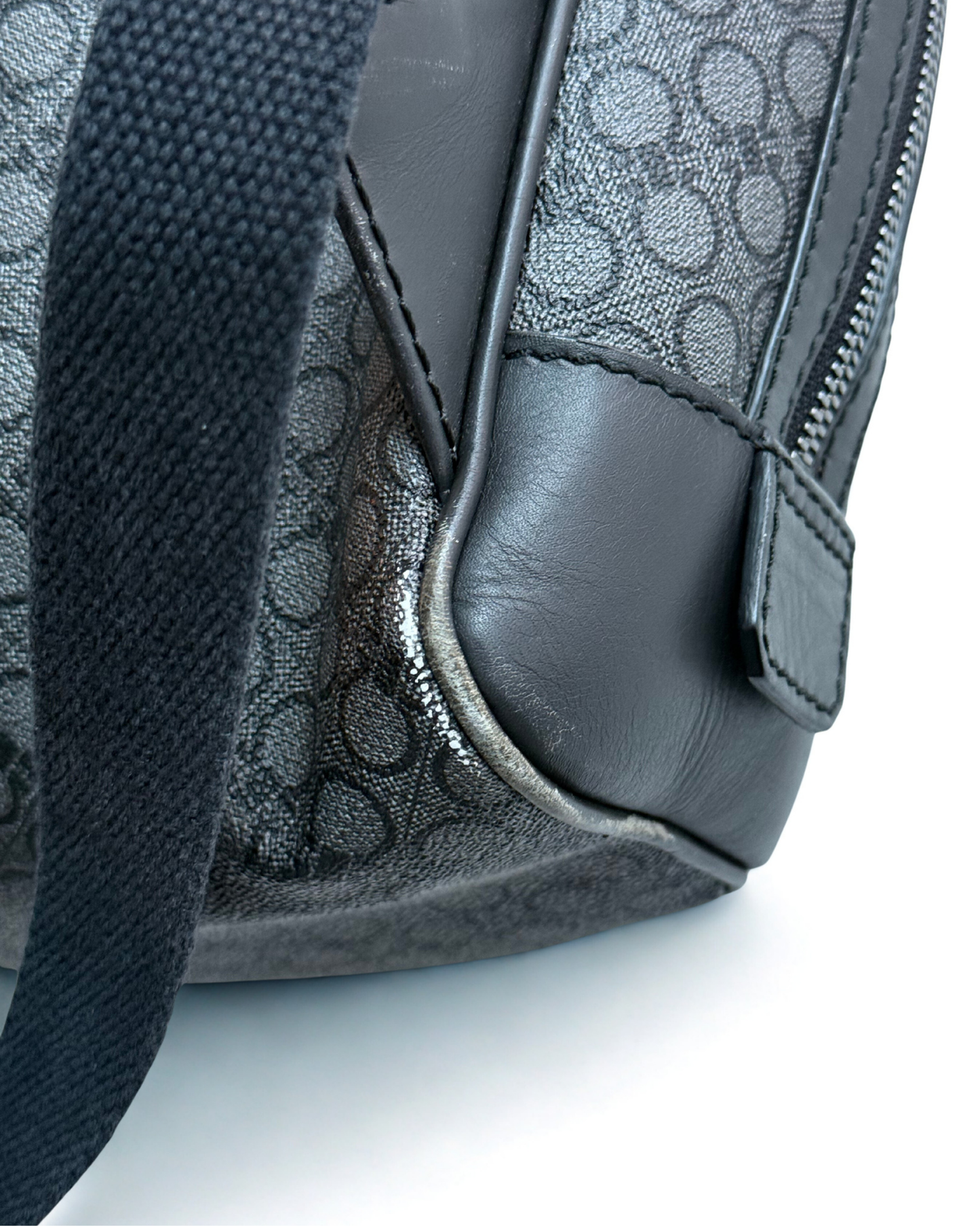 Back view of Salvatore Ferragamo grey leather backpack with pre-loved wear