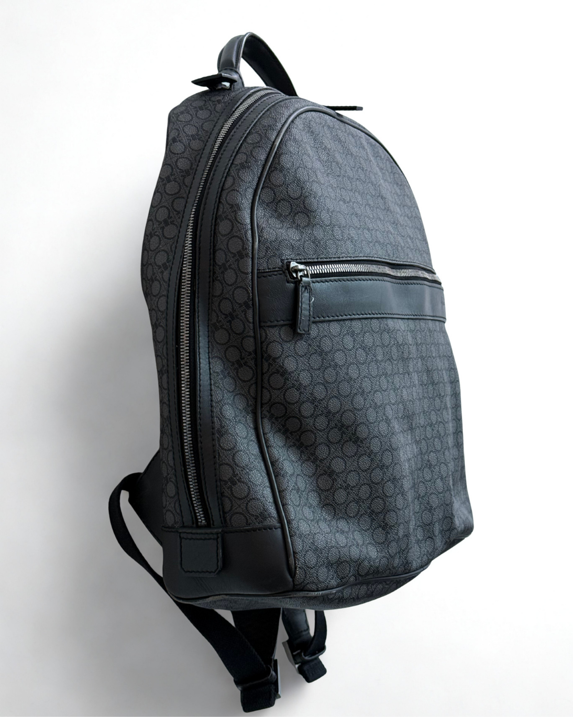 Left Side view of Salvatore Ferragamo grey leather backpack
