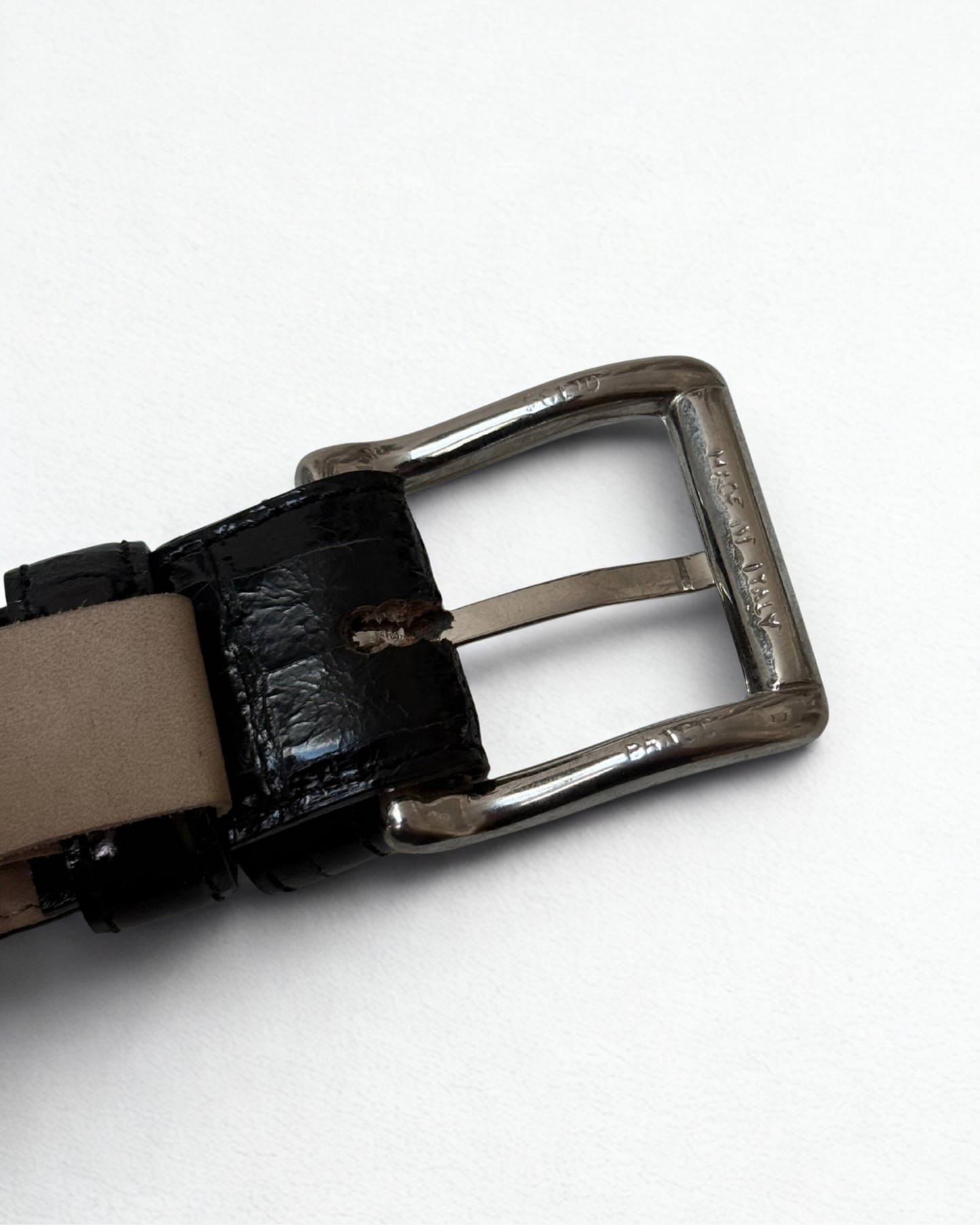 Close-up inside Buckle of vintage Van Laack crocodile leather belt in black