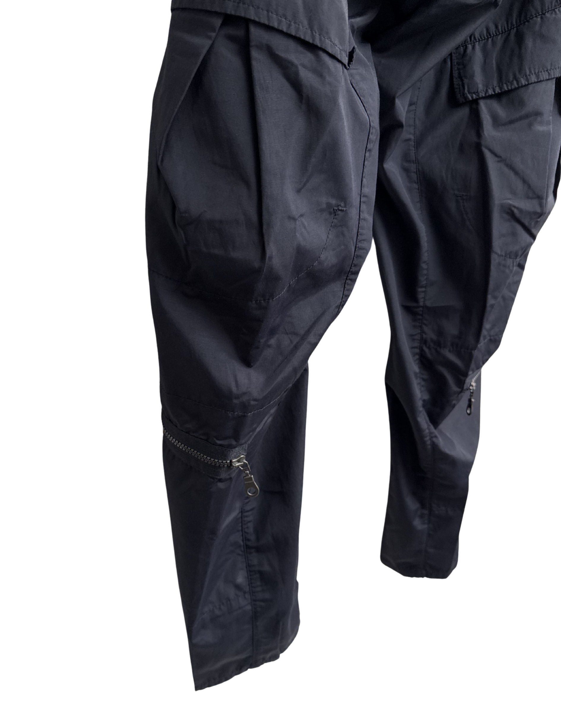 Navy cargo pants with zippers on a white background