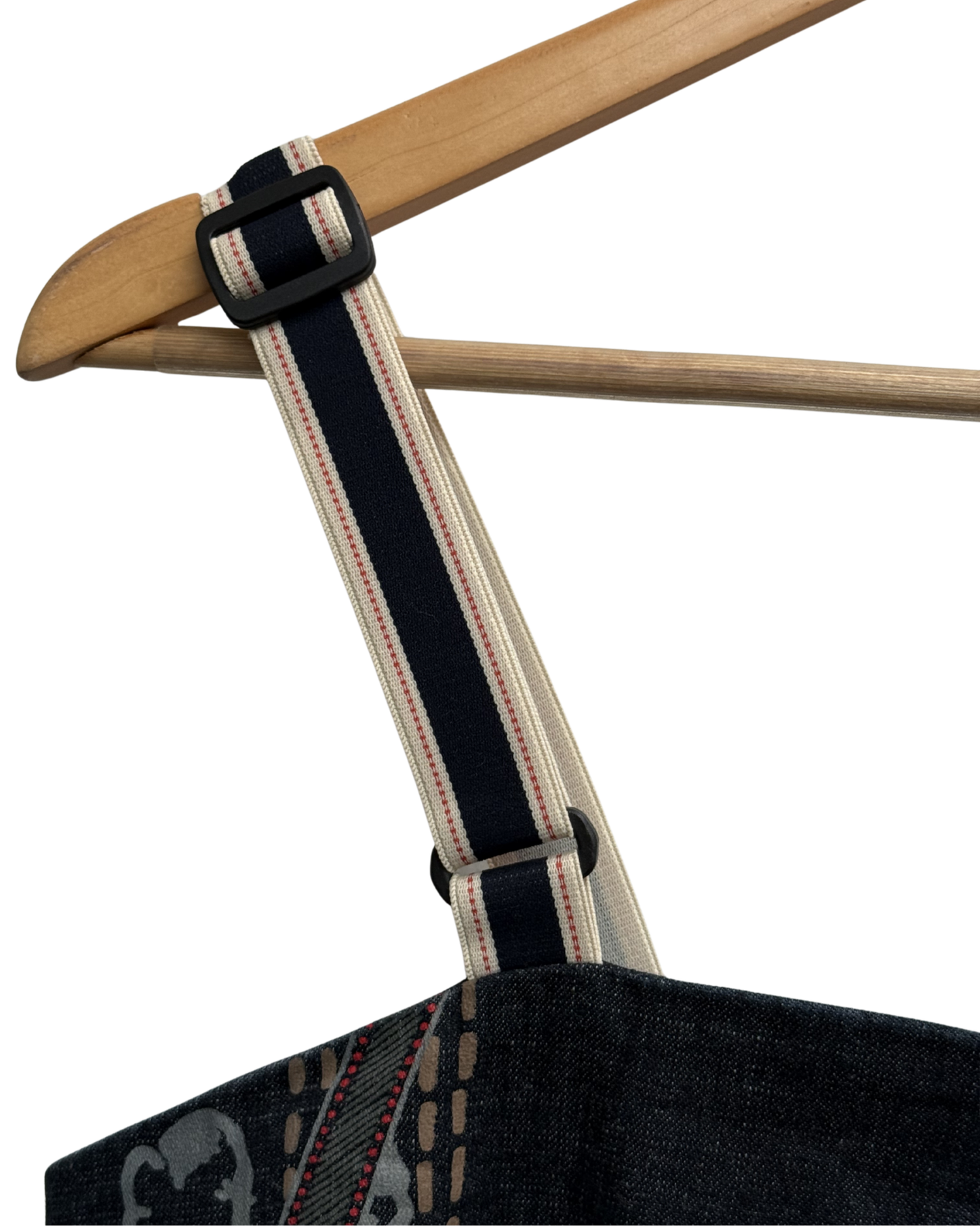 Close-up of dress elastic strap on a white background