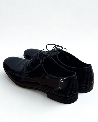 Back view of Salvatore Ferragamo patent leather dress shoes