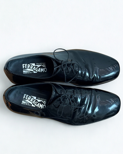 Interior view of Salvatore Ferragamo black patent leather Oxford shoes