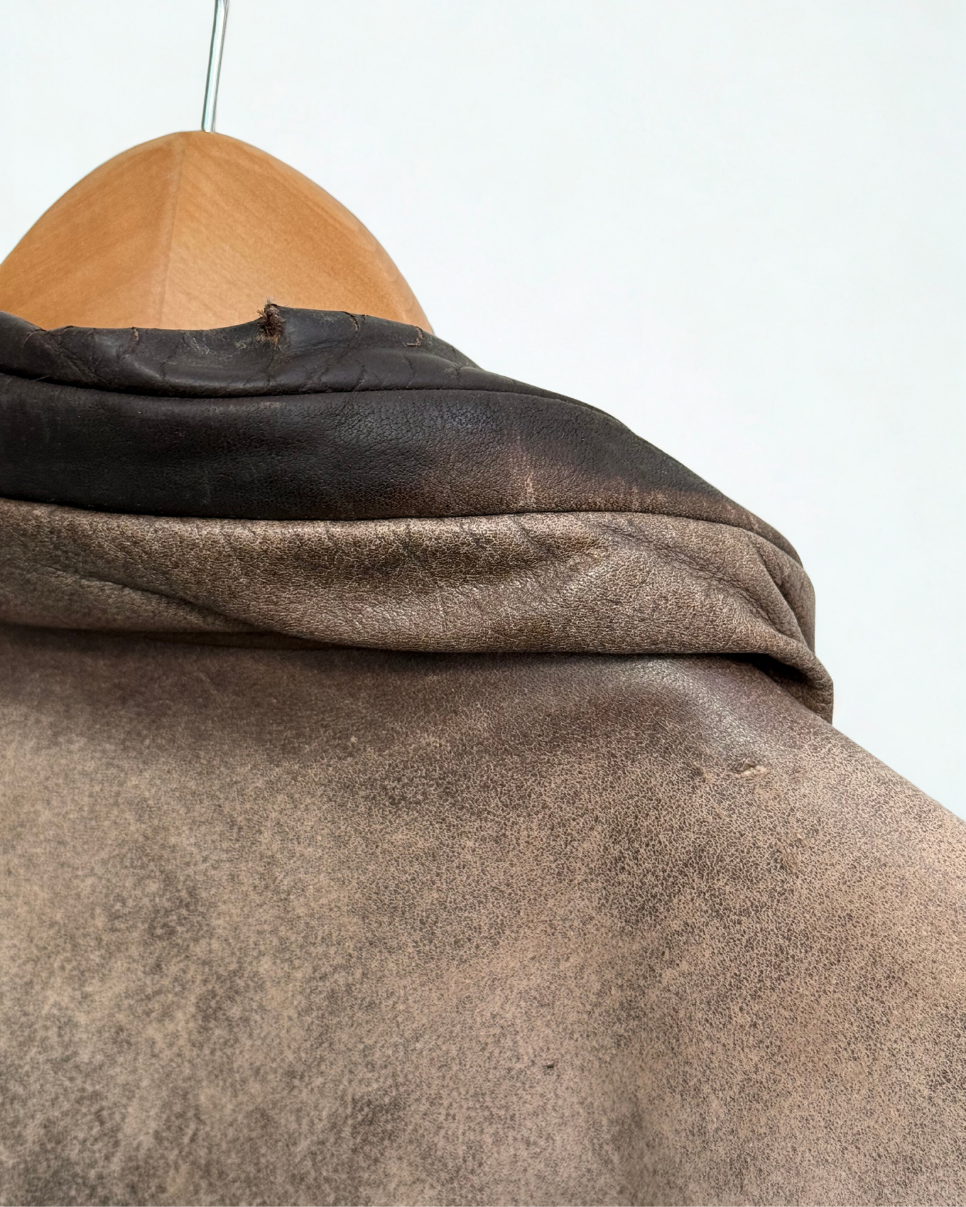 Detail showing exterior wear on collar of vintage 1980s leather bomber