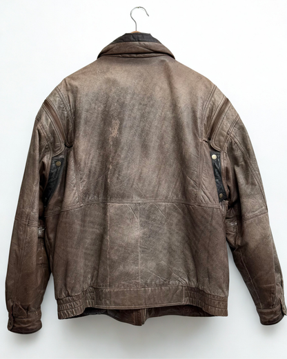 Back view of vintage leather bomber jacket showing structure