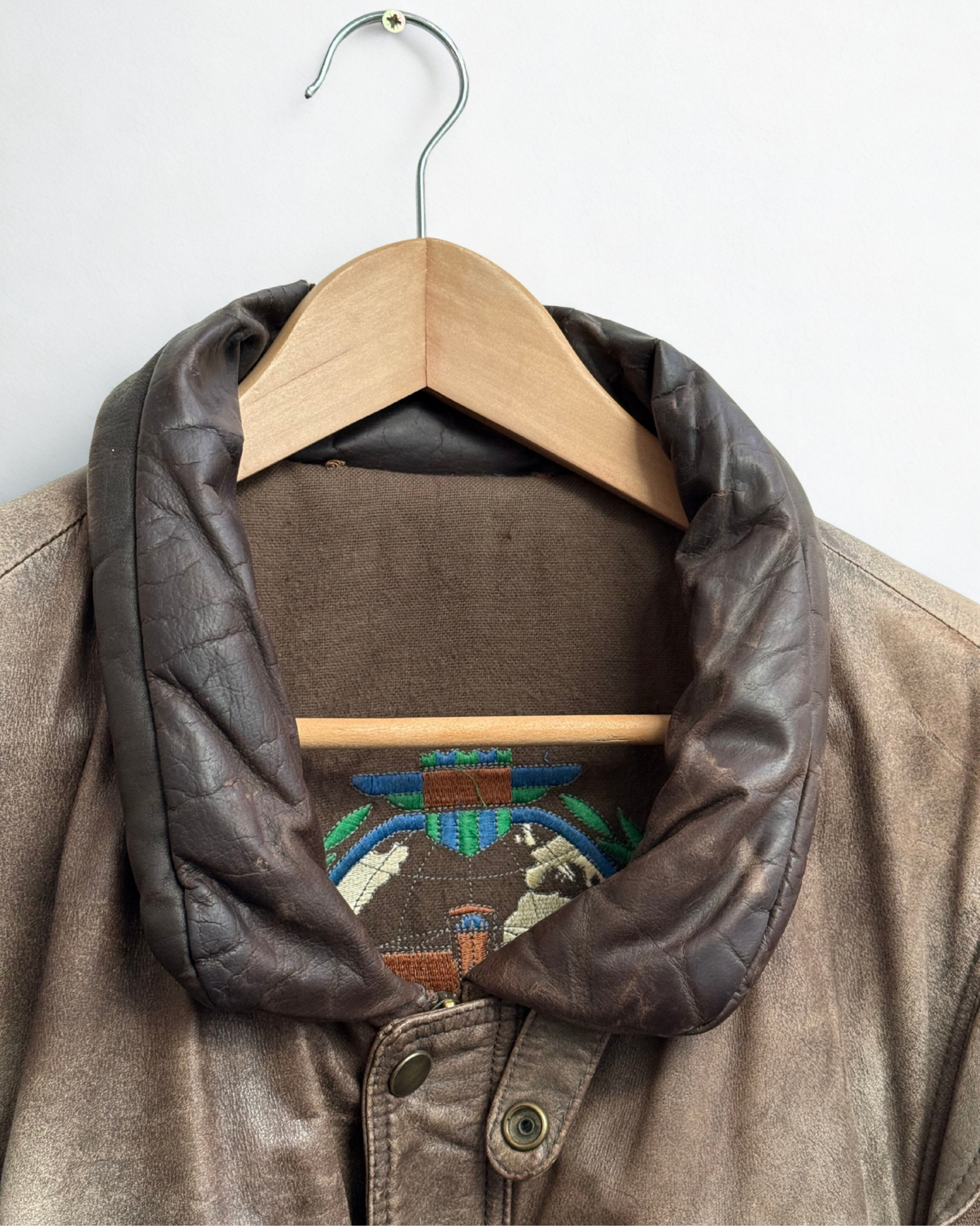 Close up of collar down leather on vintage bomber jacket