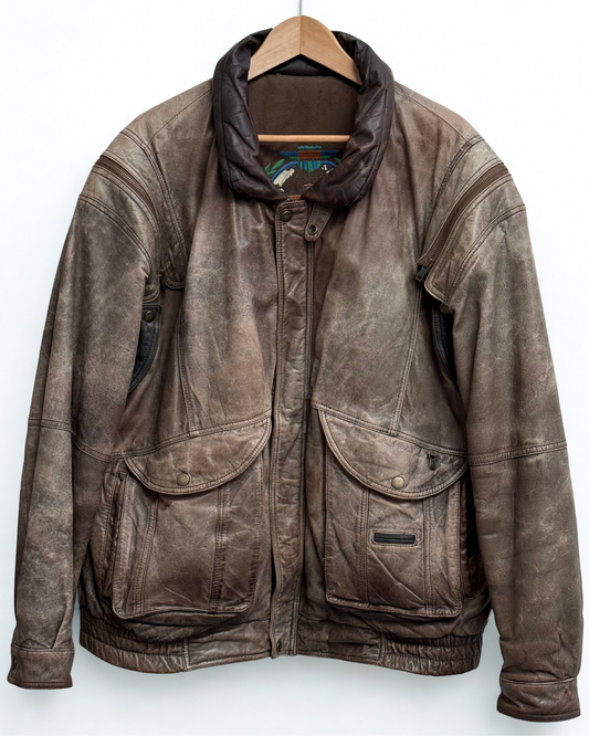 Vintage 1980s brown leather bomber jacket with removable sleeves