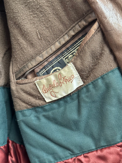 Close-up of a label on a multicolored jacket with branding.