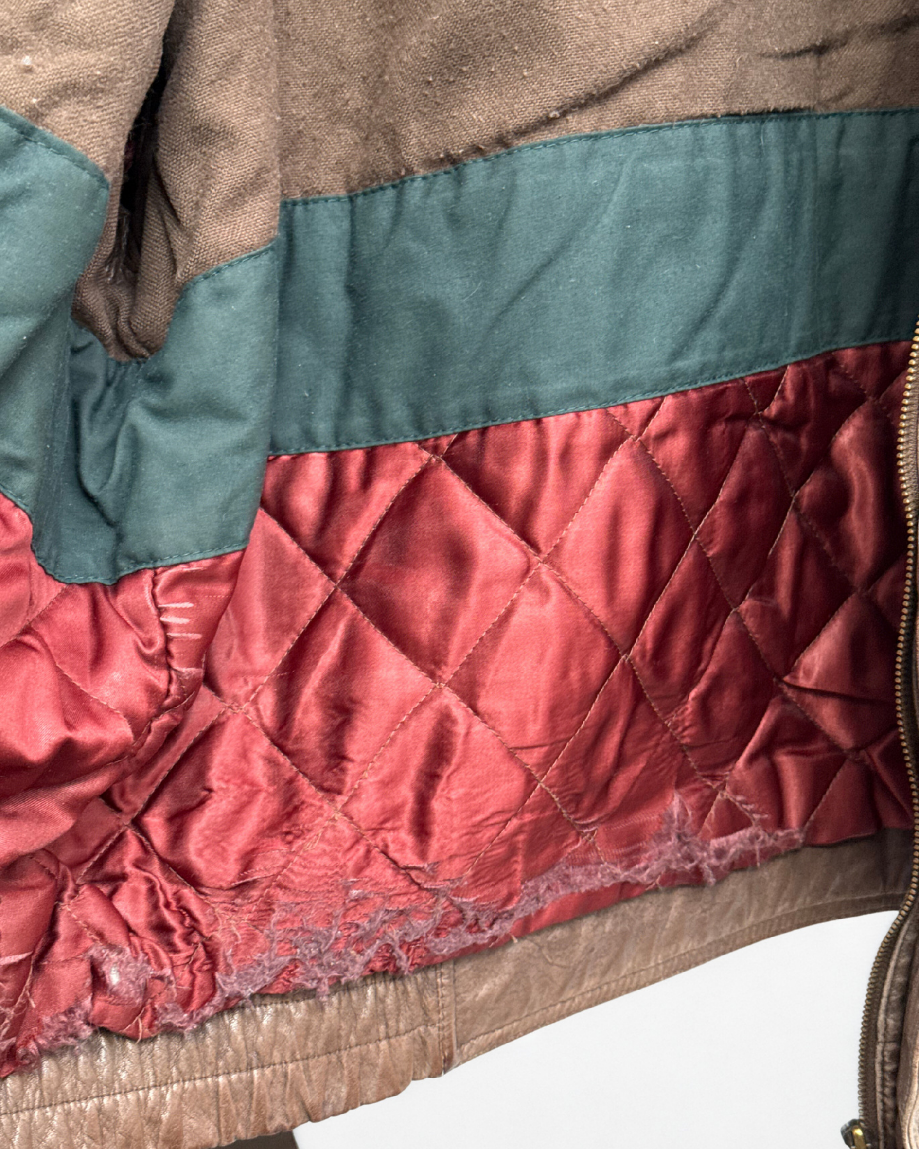 Detail showing interior wear on vintage 1980s leather bomber