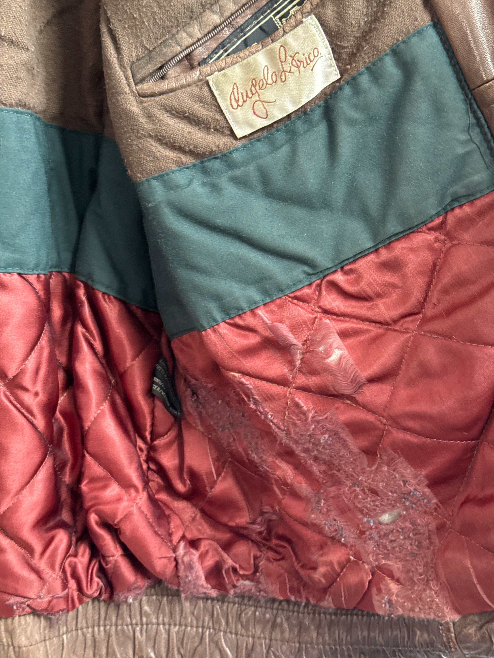 Detail showing interior wear on vintage 1980s leather bomber