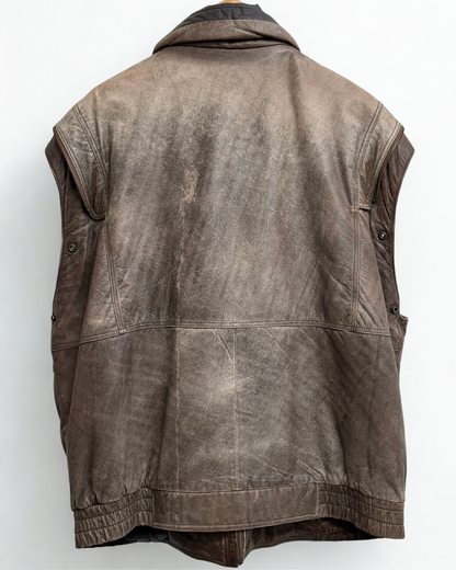 Back view of vintage leather bomber jacket showing structure without sleeve