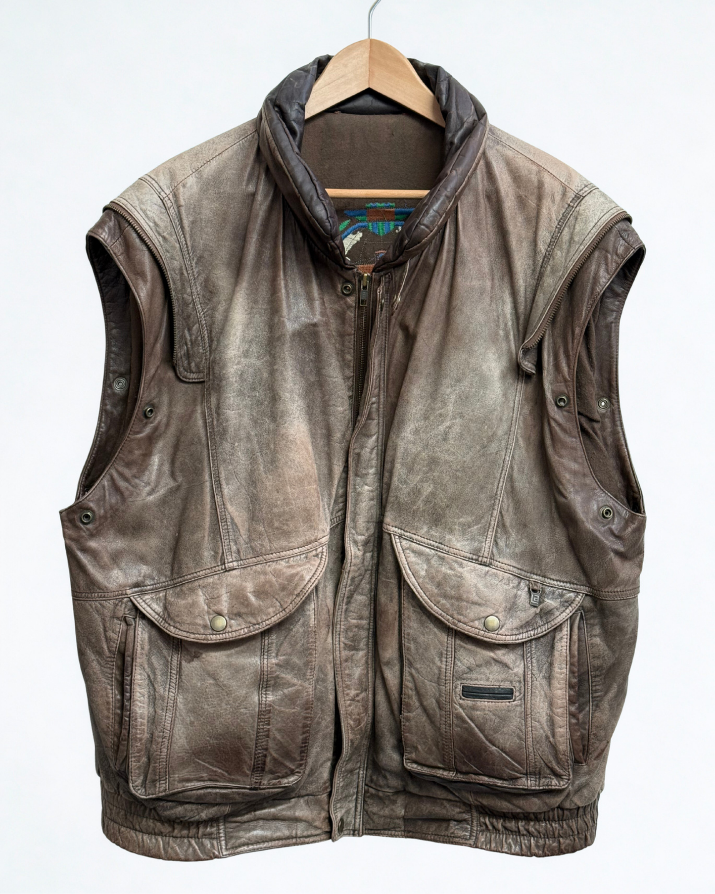 Front view of vintage brown leather bomber jacket without sleeve