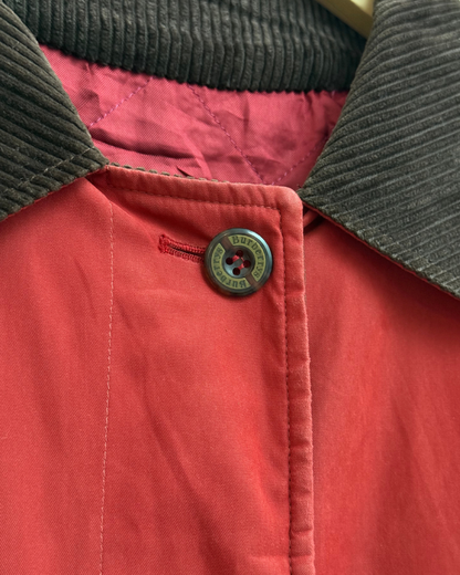 Vintage Burberry’s button detail on coat