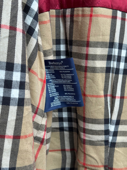 Close-up on Burberrys vintage coat brand label.