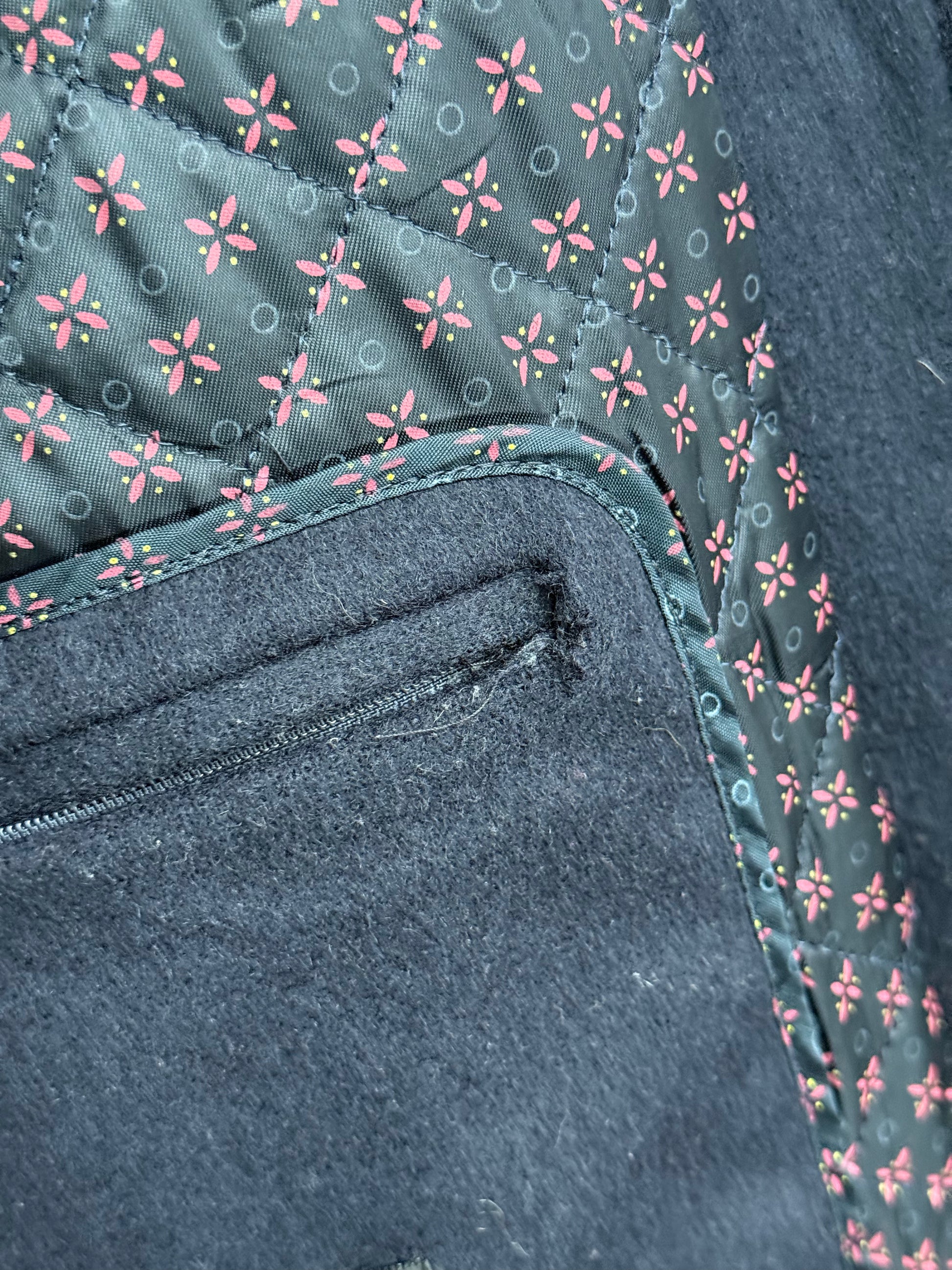 Close-up of detail showing inside pocket zip condition on Steinbock jacket