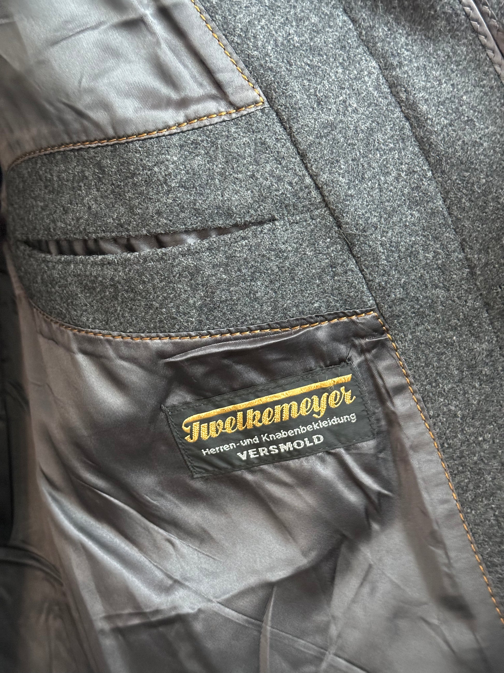 Tailor label detail inside vintage coat