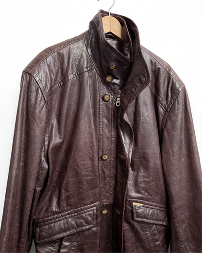 High collar detail on vintage Patino Road leather overcoat
