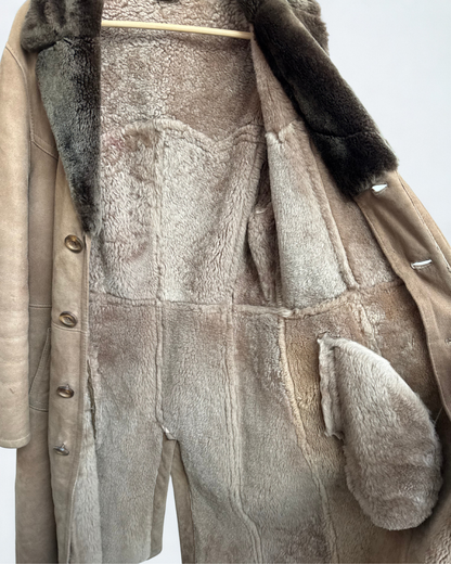Close up of shearling interior on lammy coat to left