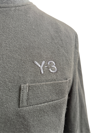 Black wool blend fabric texture detail and Y-3 embroidery