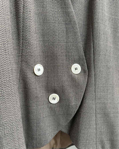 Close up of virgin wool fabric and button detail on Karl Lagerfeld blazer