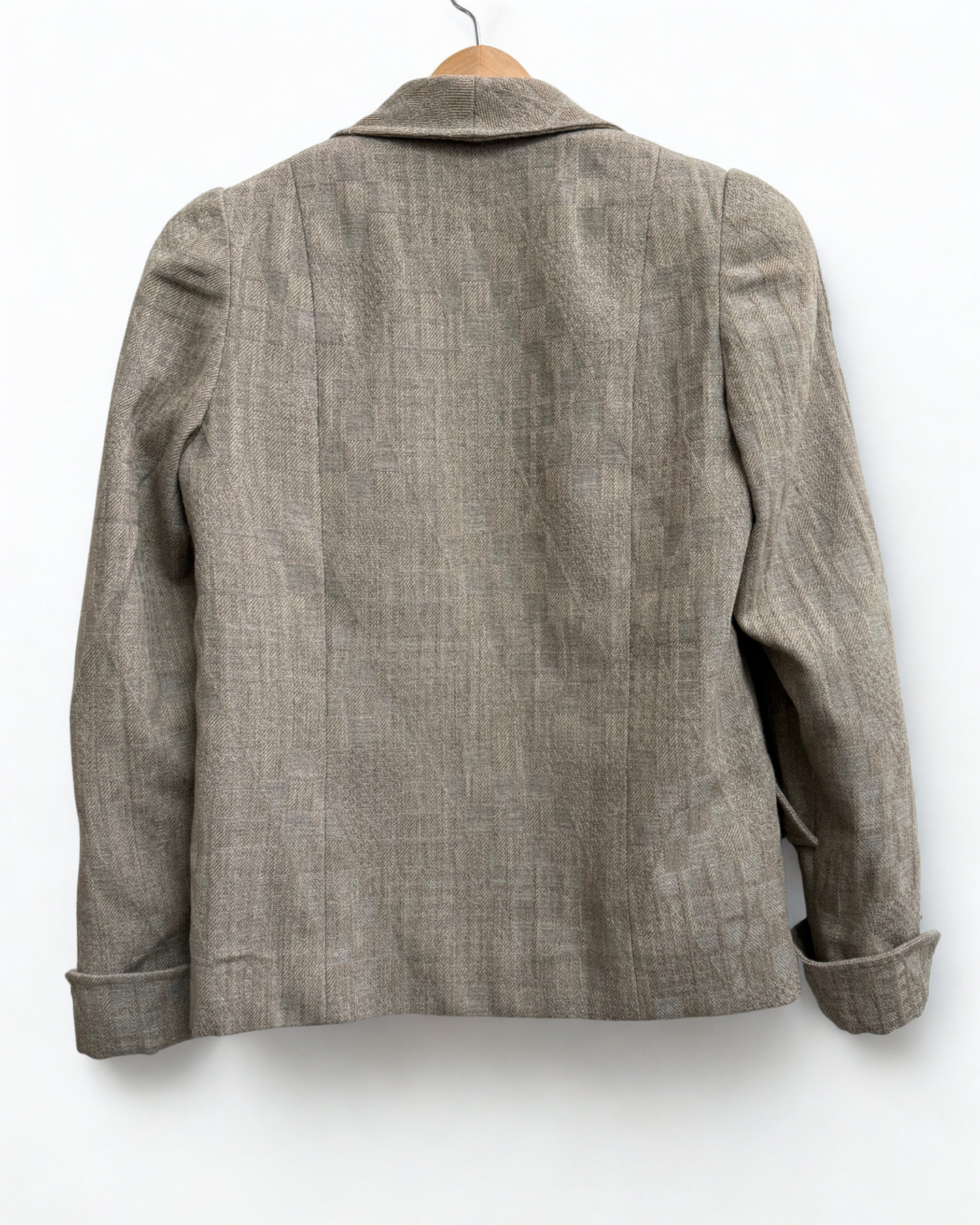Back view of vintage womens beige tailored blazer