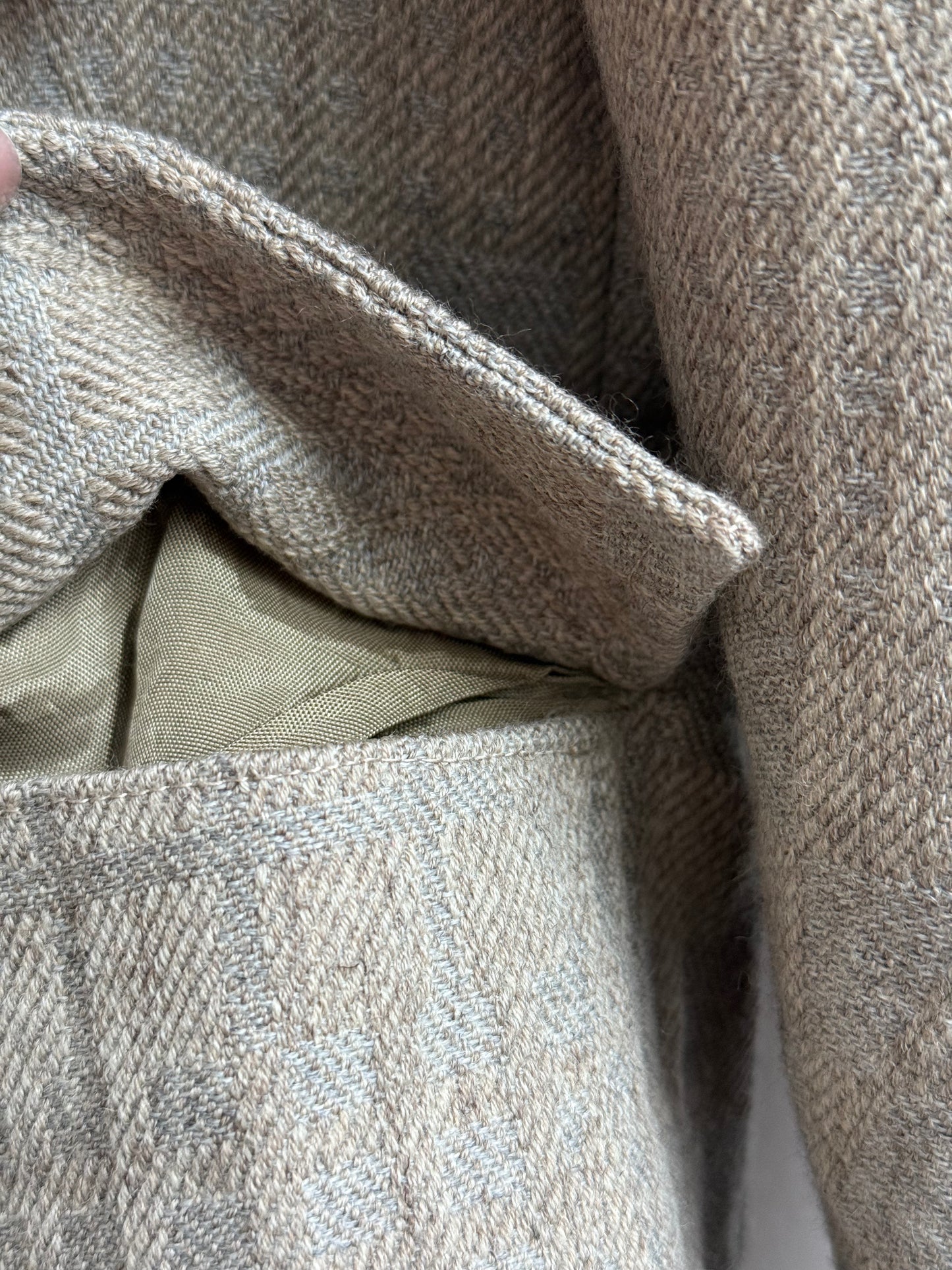 pocket detail on vintage beige wool blazer