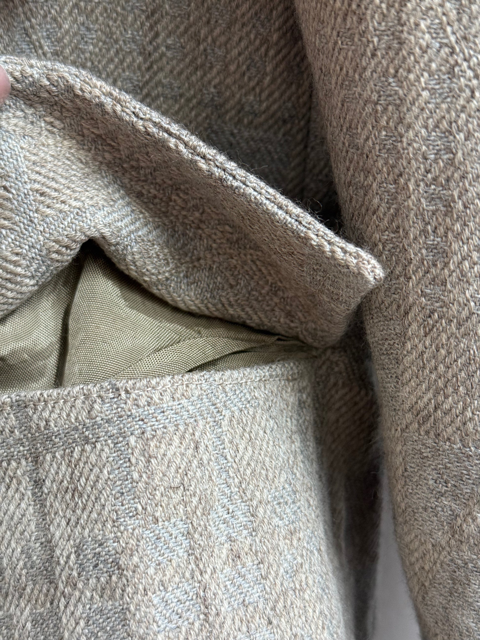 pocket detail on vintage beige wool blazer