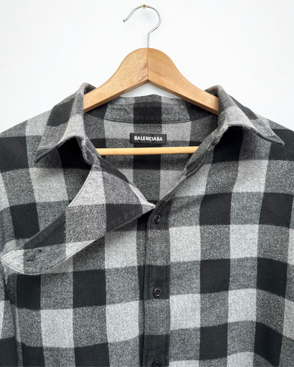 Collar and neck closure detail on Balenciaga flannel shirt