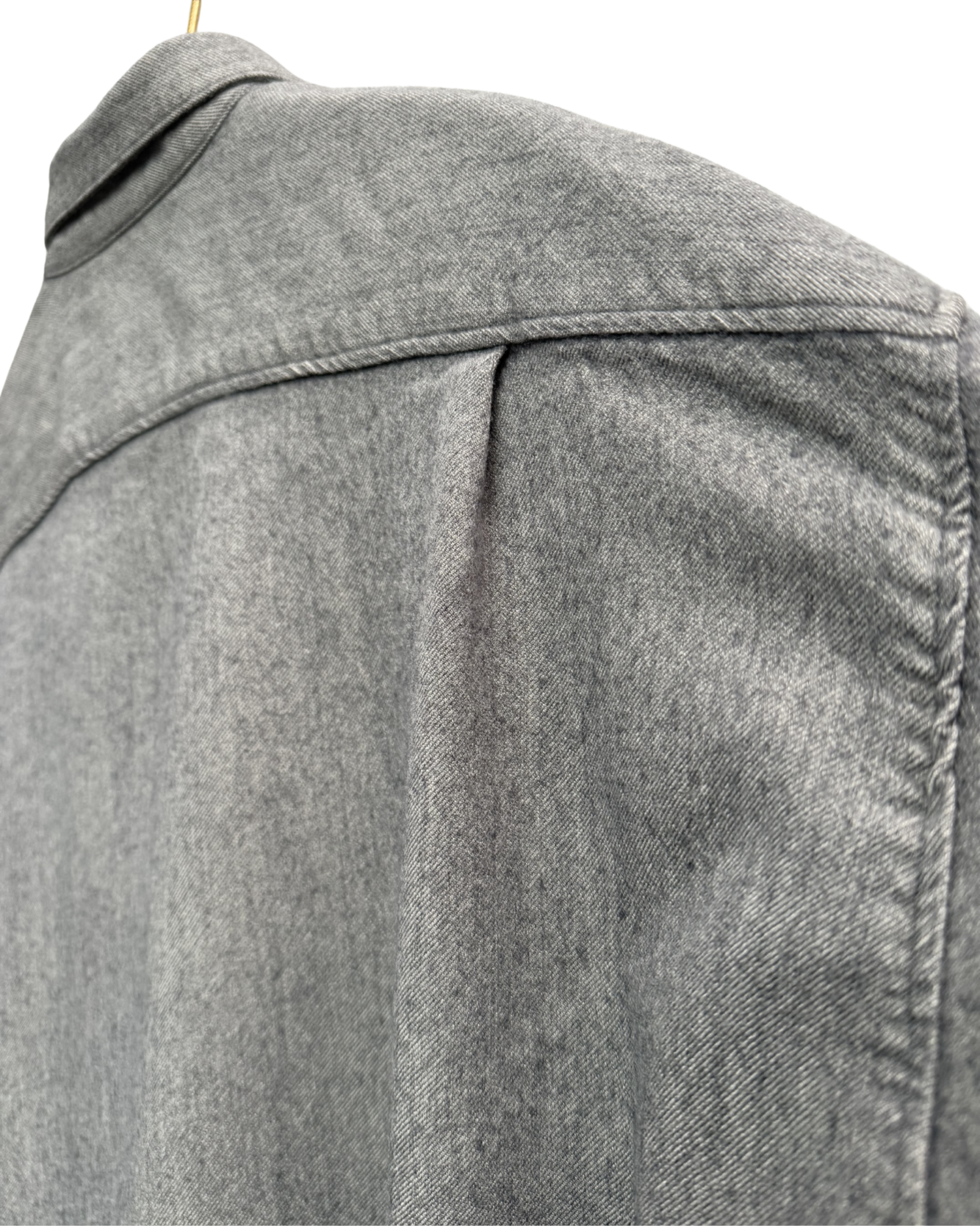 Second pleat on back of Issey sports grey shirt